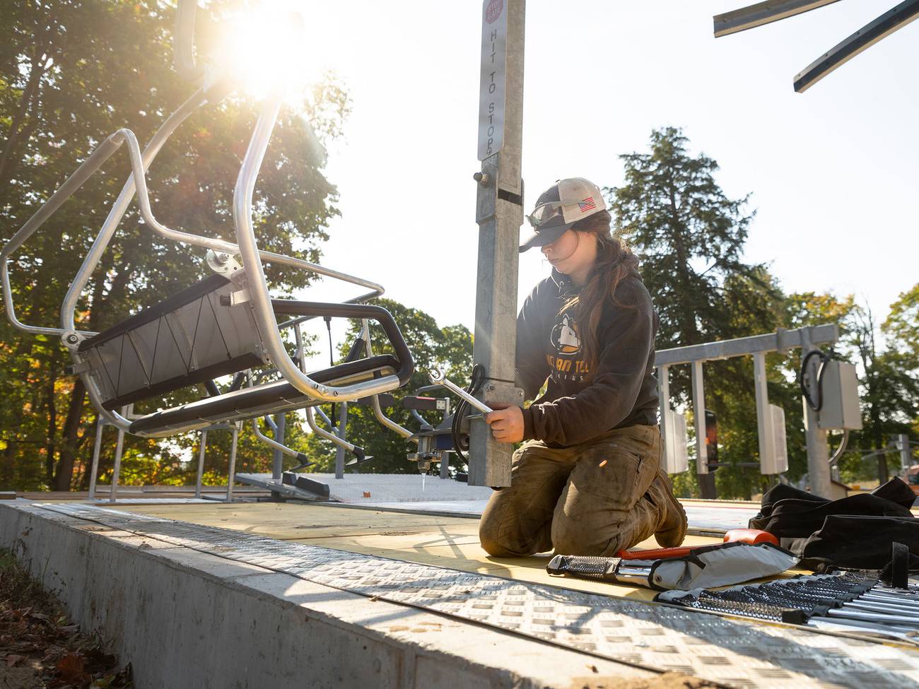 A Highlands Team Member doing lift maintenance