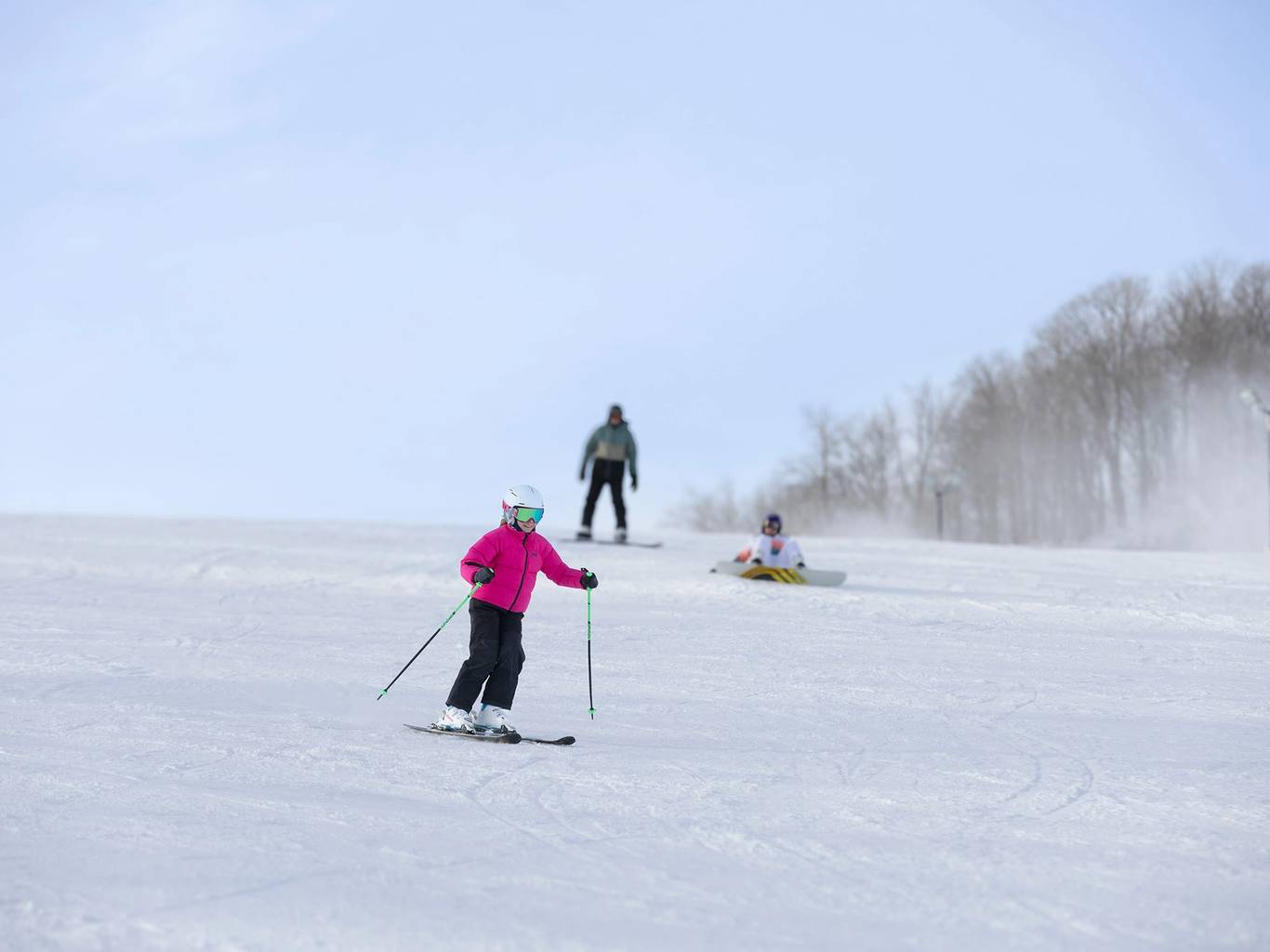 A kid in ski gear at The Highlands