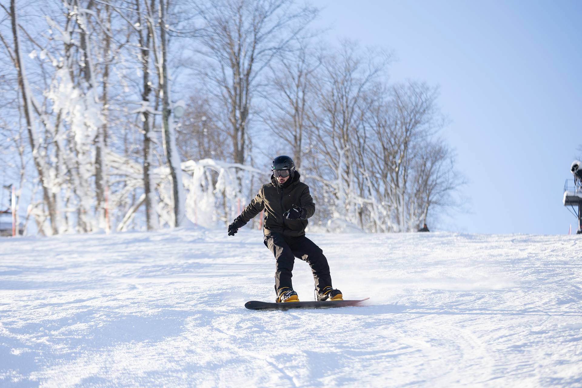 A snowboarder at The Highlands