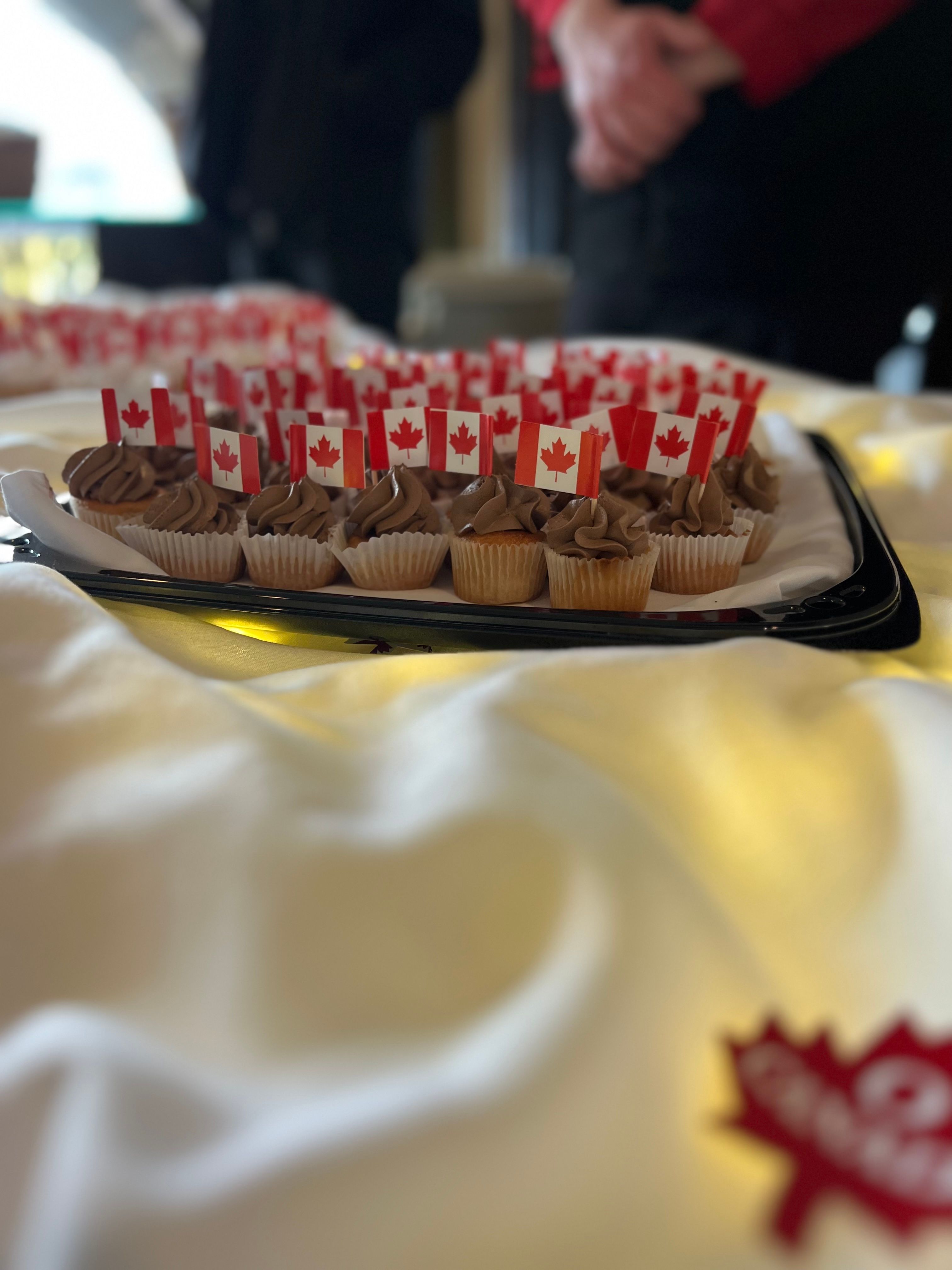 Cupcakes decorated with Canadian Flags