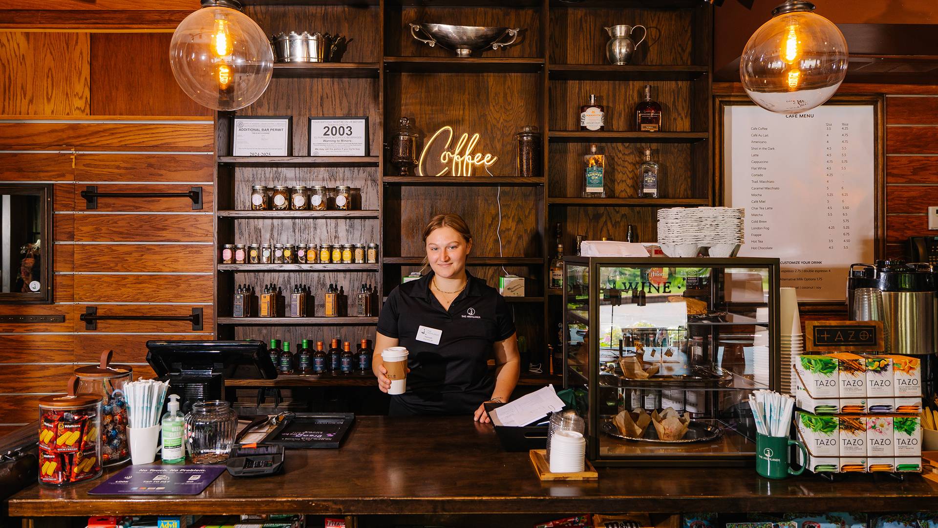 A barista at The Highlands Café