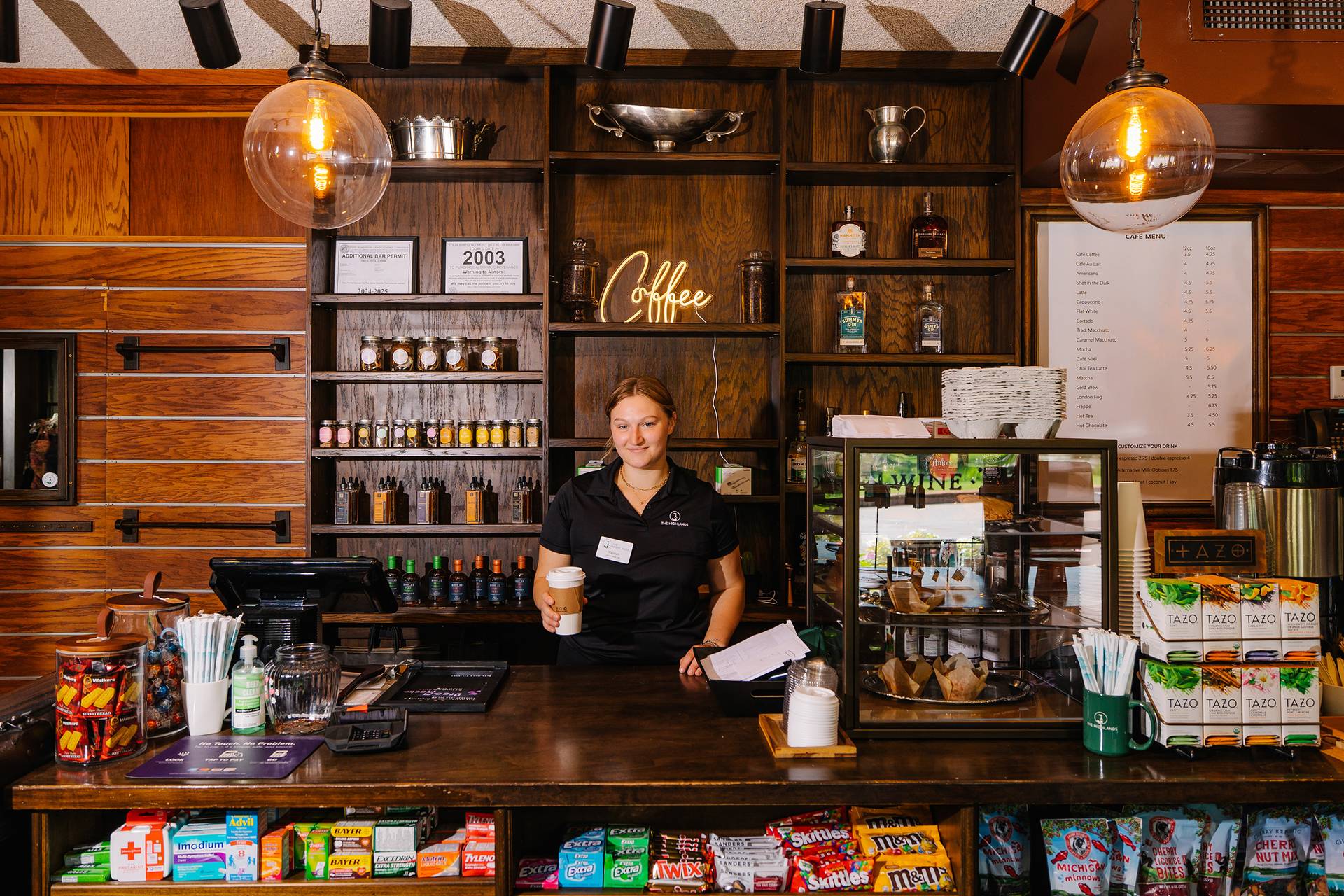 A barista at The Highlands Café