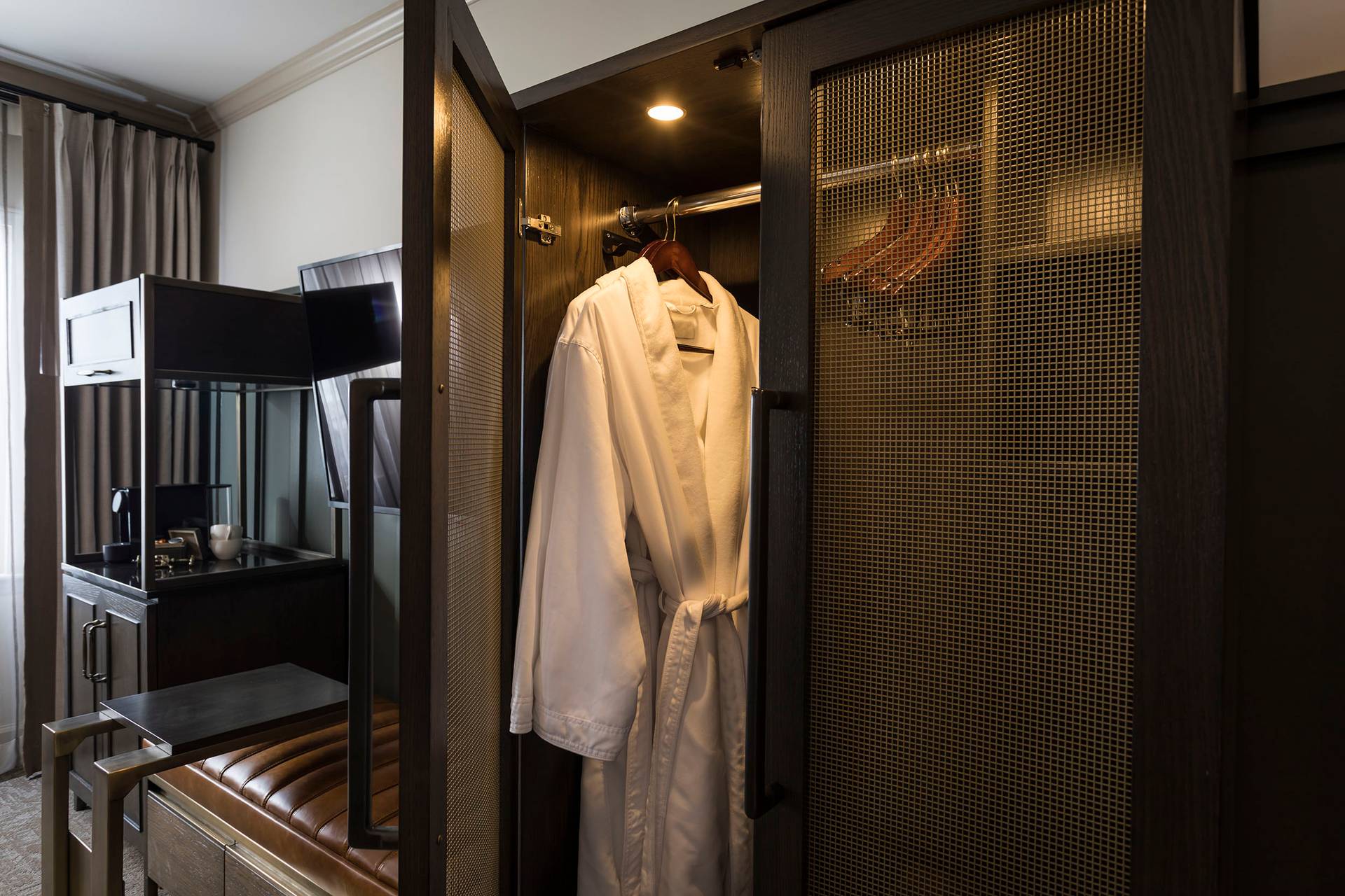 Main lodge room closet and robes at The Highlands