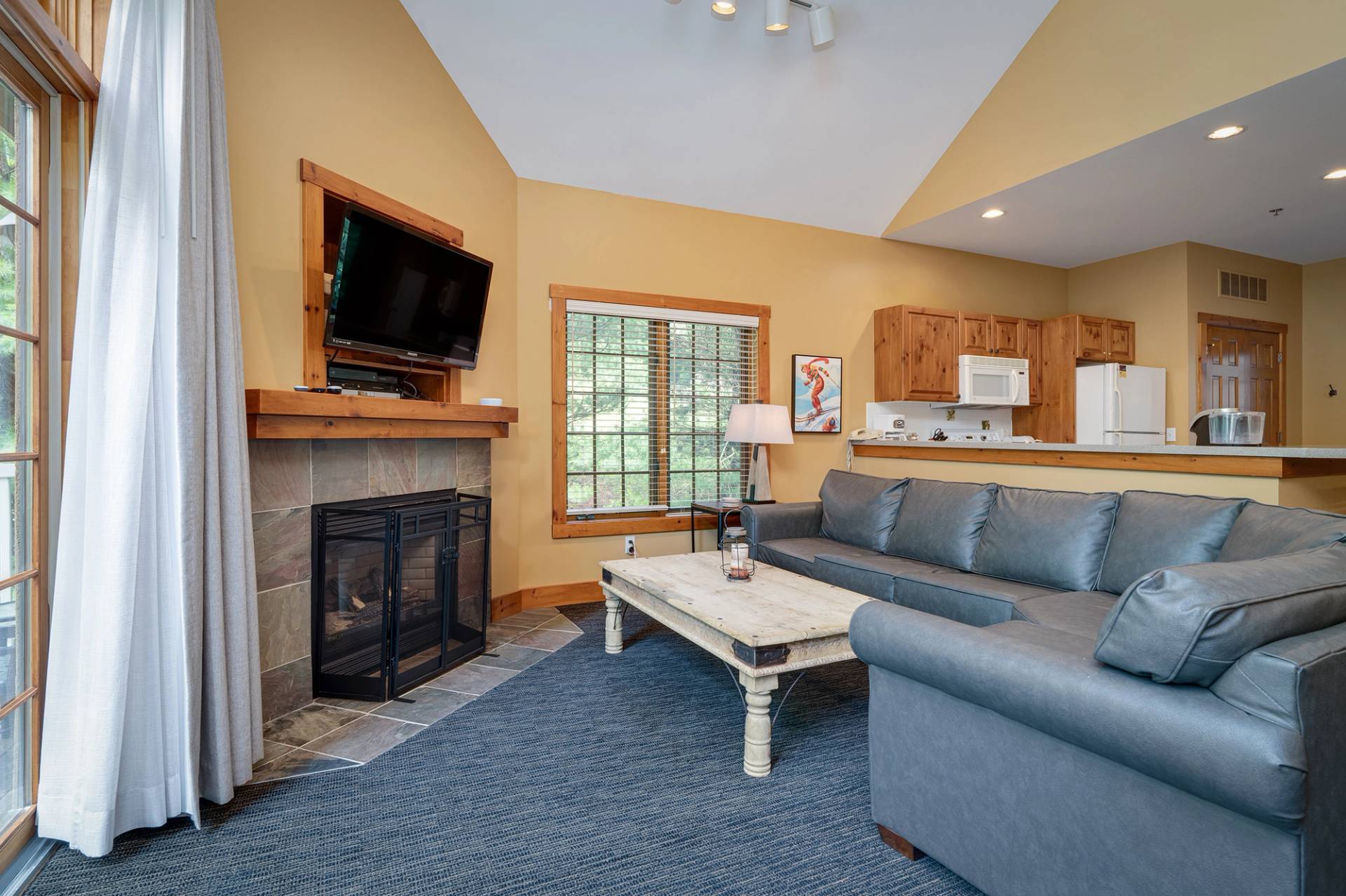 Alpine Village main living room with fireplace at The Highlands