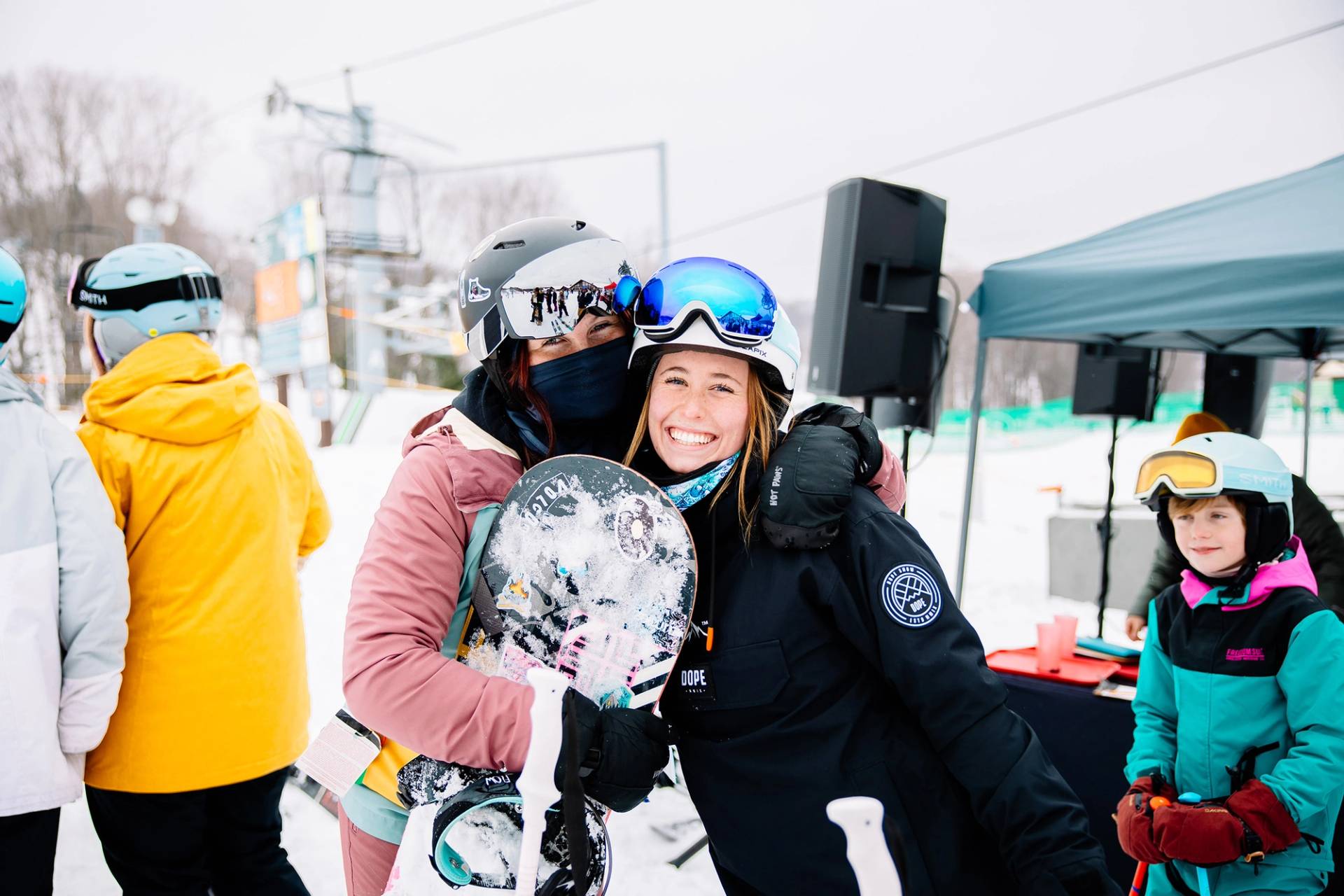 Two women in ski gear posing