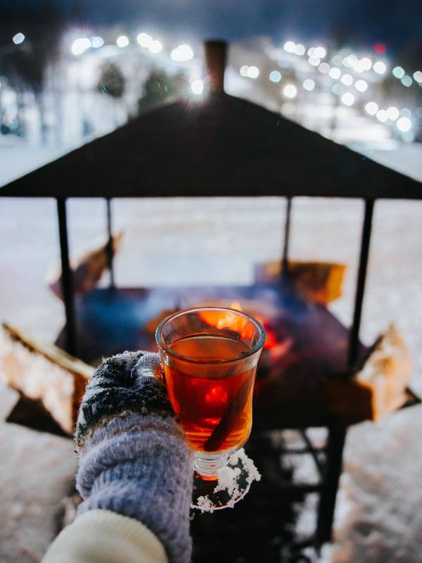 Warm spiced cider in front of a winter bonfire at The Highlands