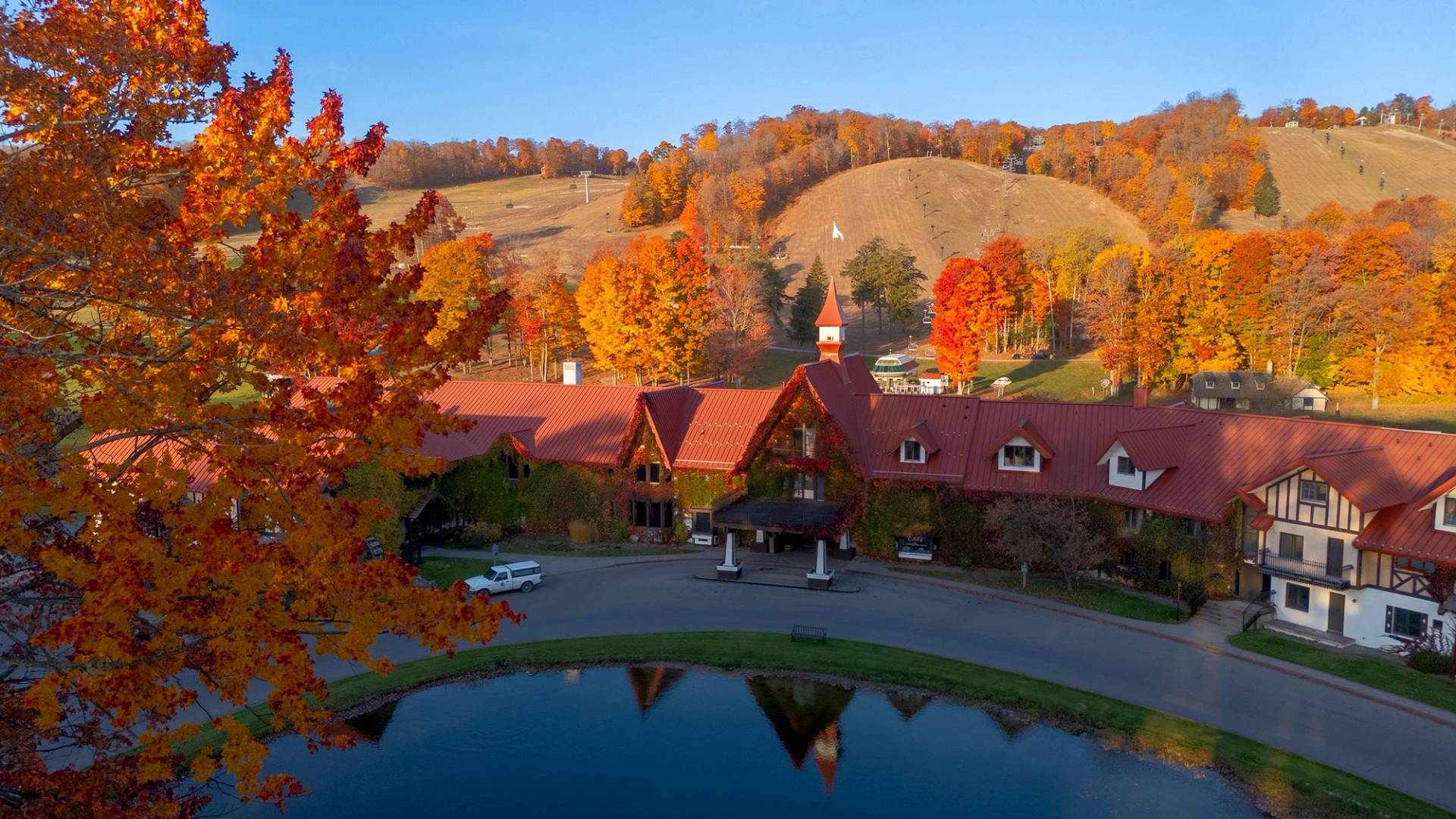 Drone shot of the Main Lodge exterior during fall