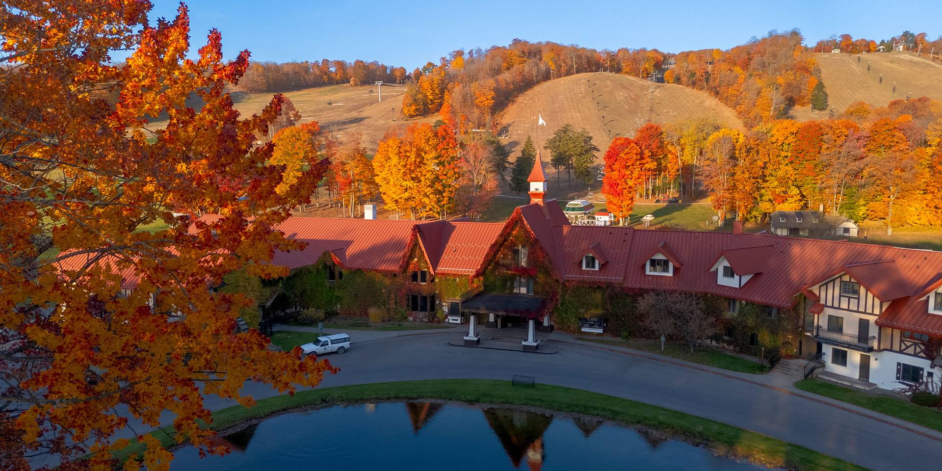 Drone shot of the Main Lodge exterior during fall
