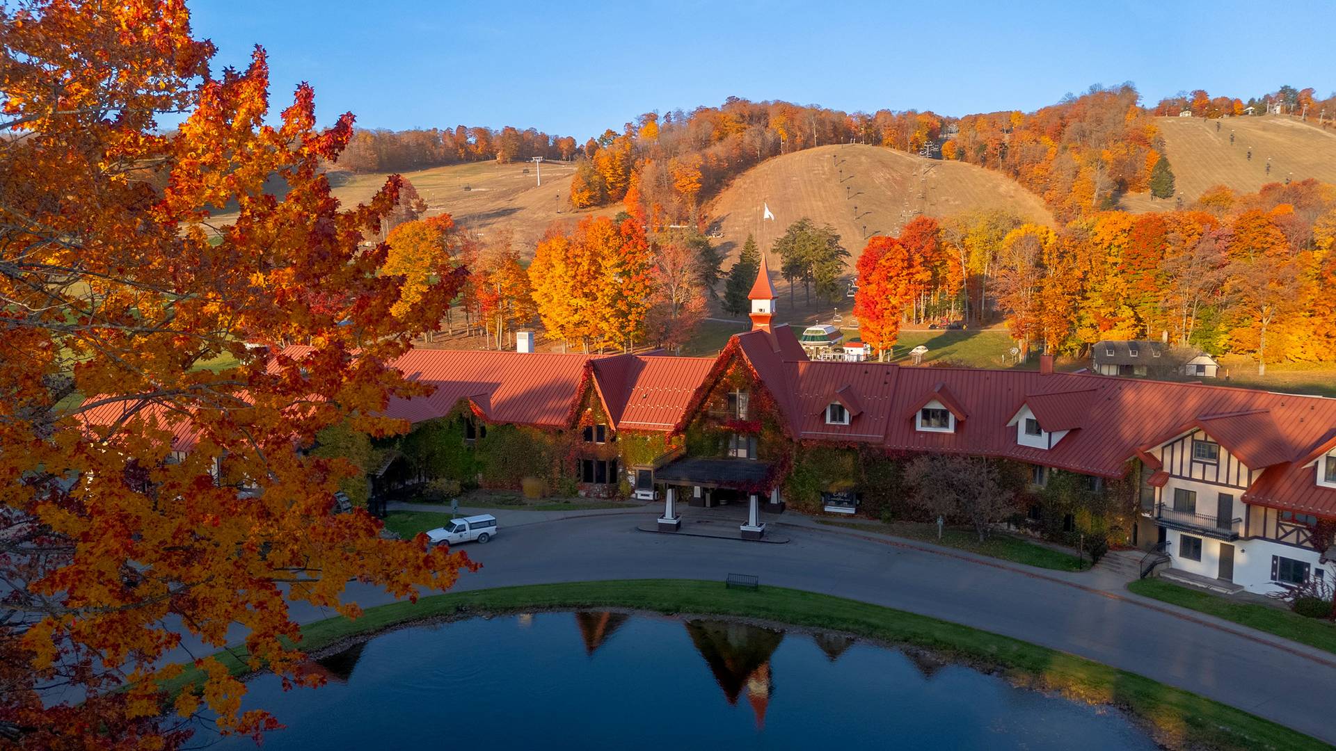 Drone shot of the Main Lodge exterior during fall