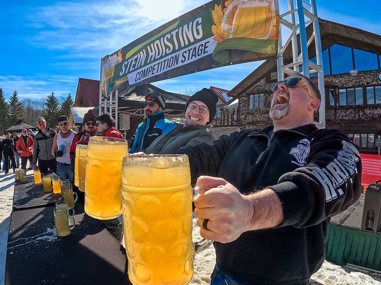 Men at the stein hoisting contest during the Hops 'N Highlands event