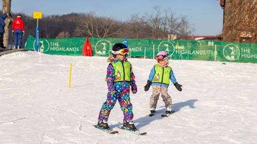 A kids ski lesson at The Highlands