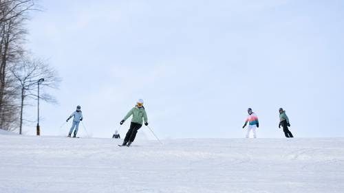 Skiers at The Highlands