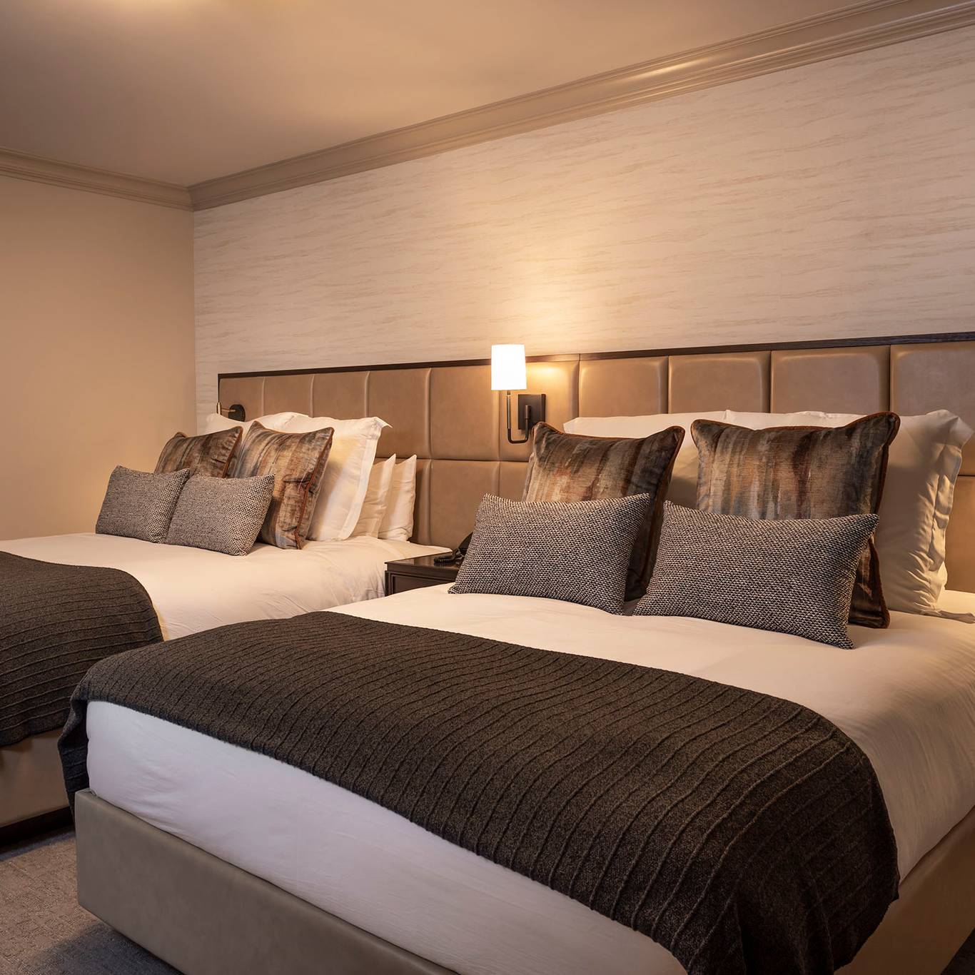 The hazel two queen bedroom in the Main Lodge at The Highlands