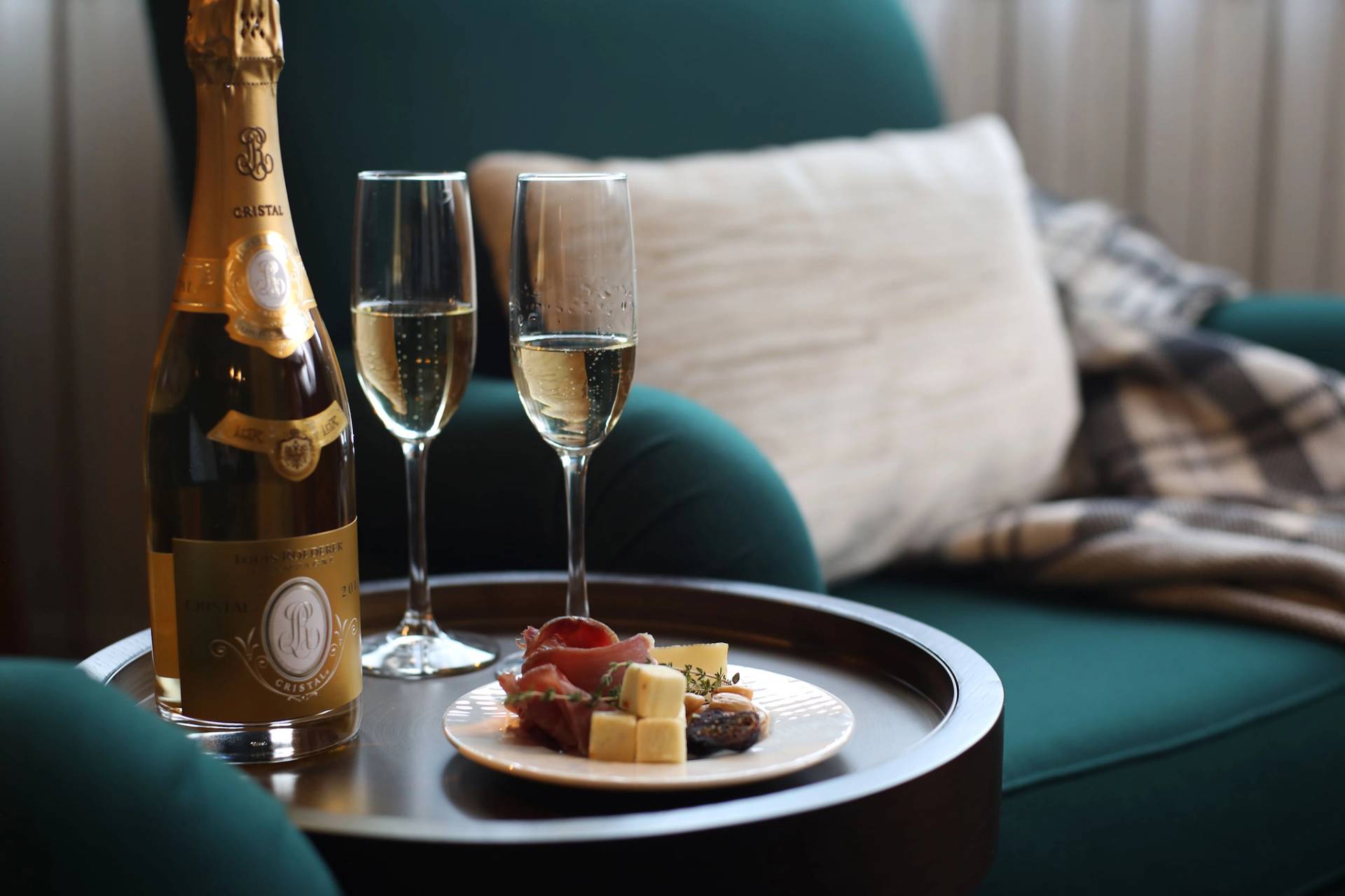 Main lodge charcuterie board with champagne at The Highlands