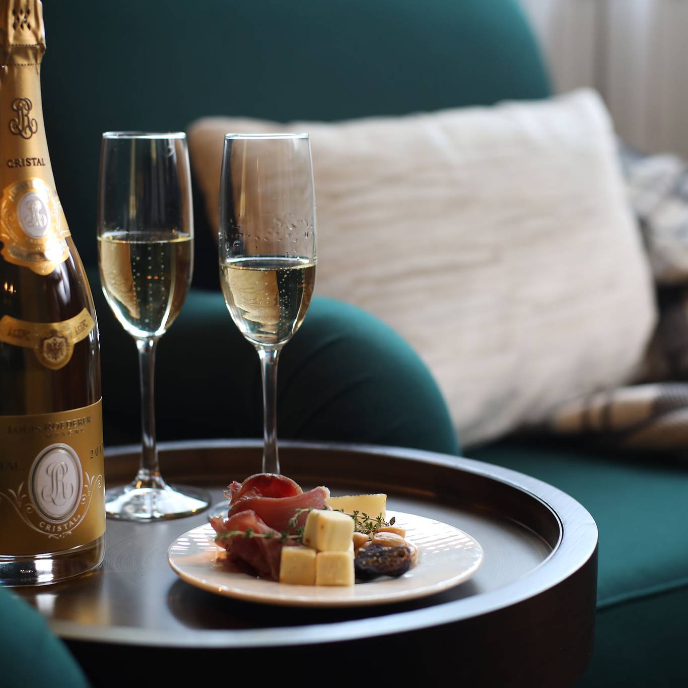 Main lodge charcuterie board with champagne at The Highlands