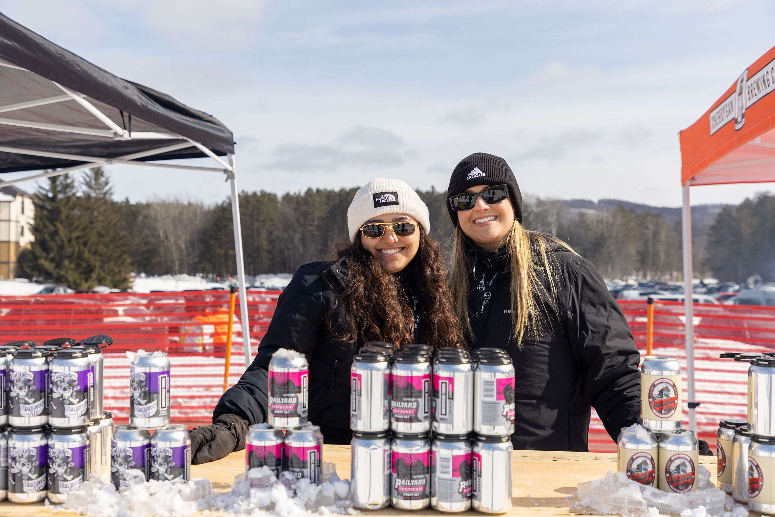 Two women smiling at the Hops 'N Highlands event