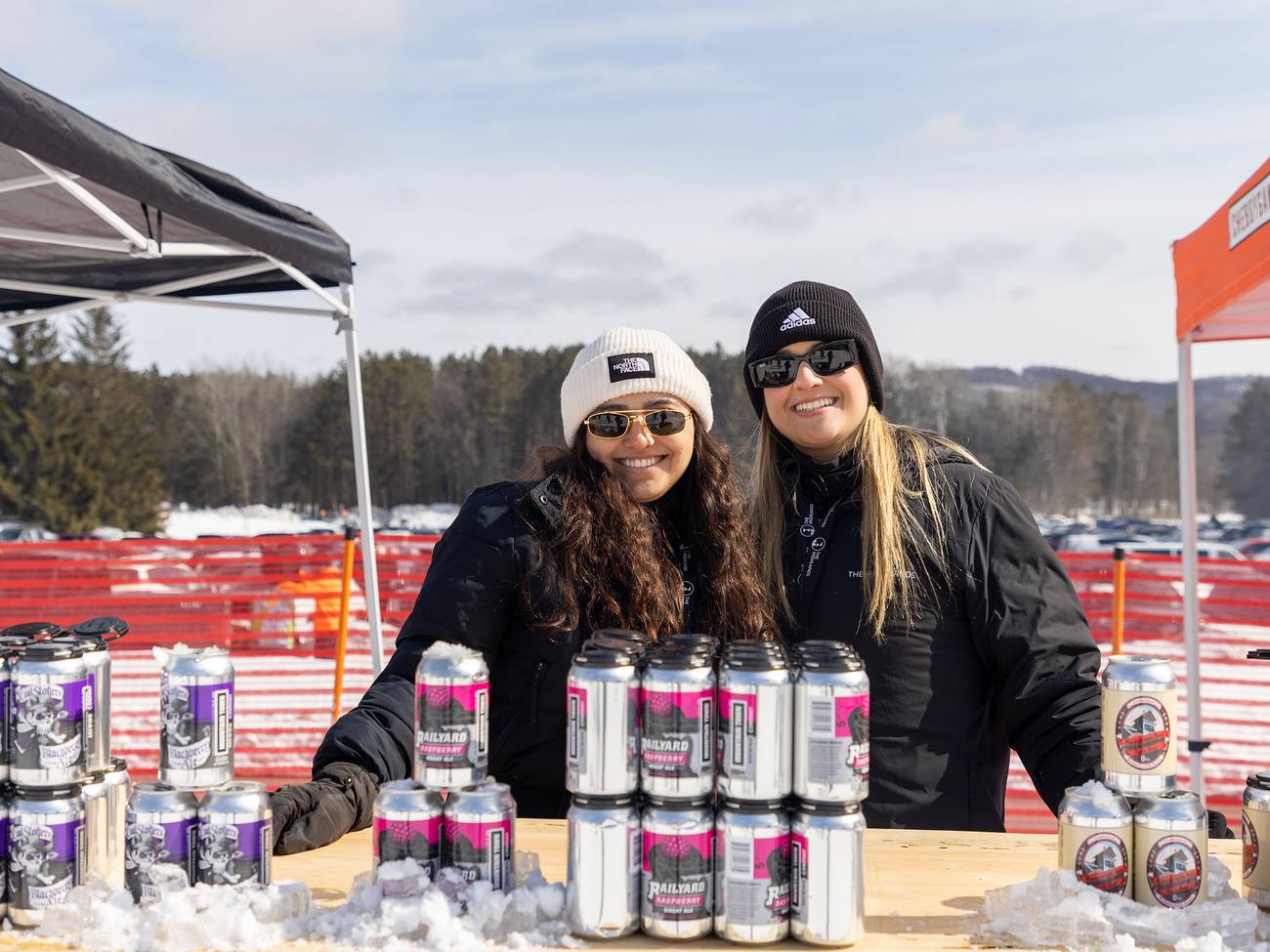 Two women smiling at the Hops 'N Highlands event