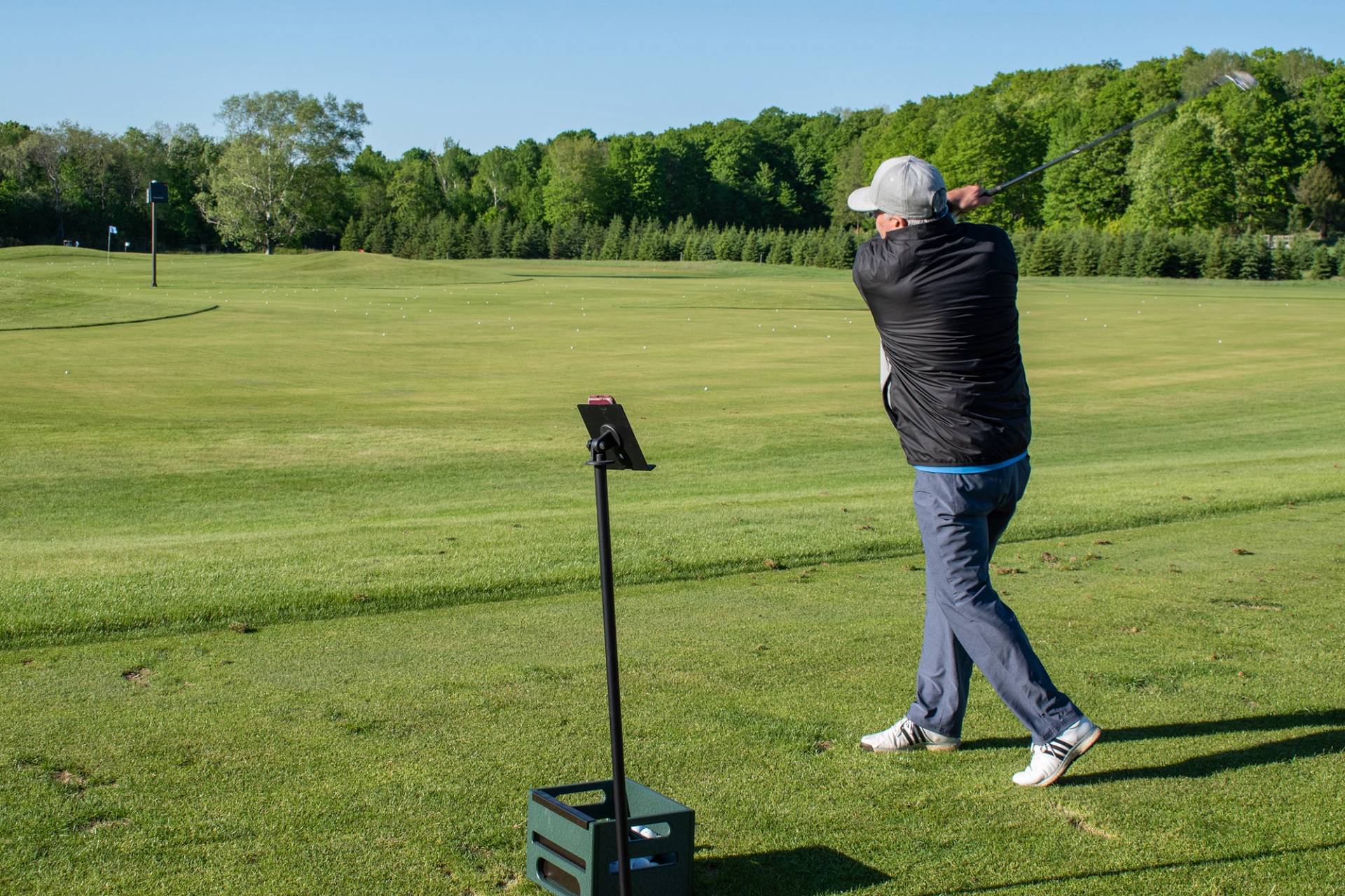 A man on the TrackMan Range