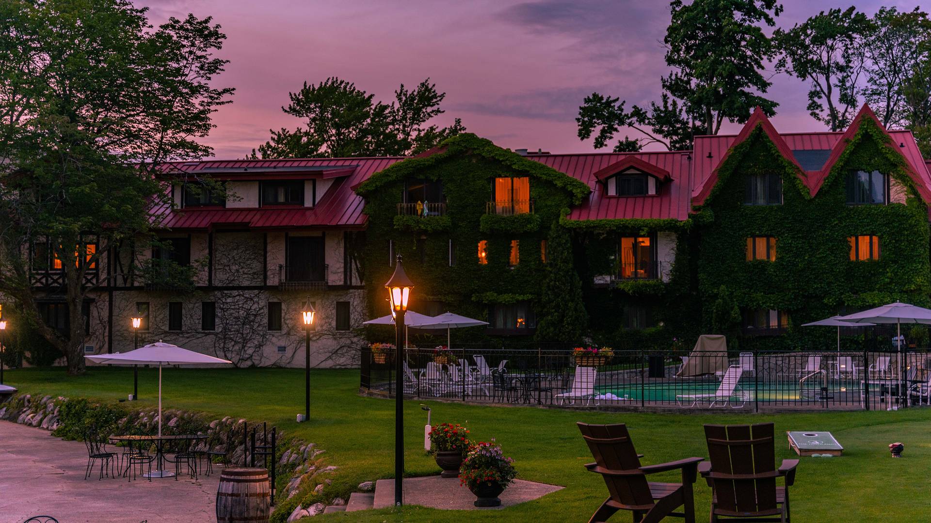 The Main Lodge backyard and pool in summer