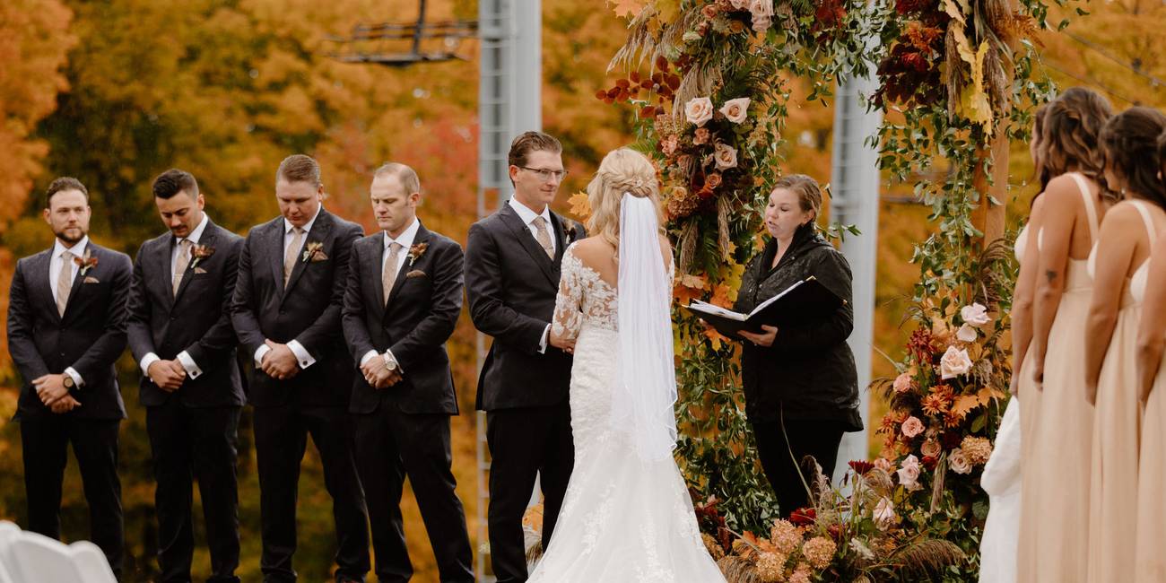 A wedding near a chairlift in fall