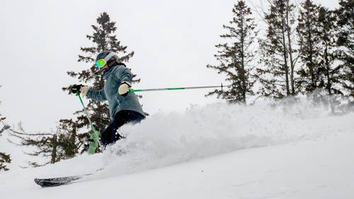 A snowboarder at The Highlands