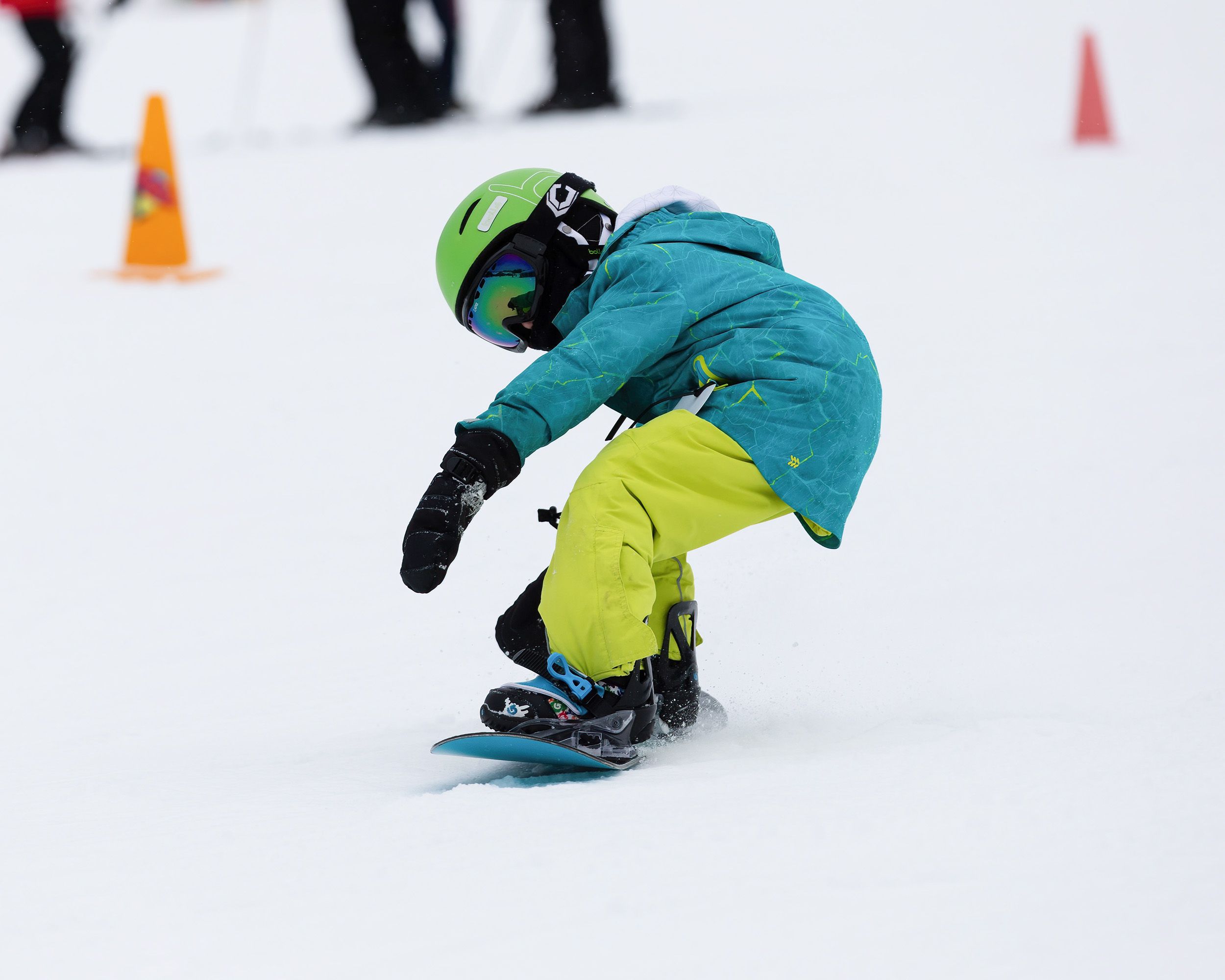 A child snowboarding