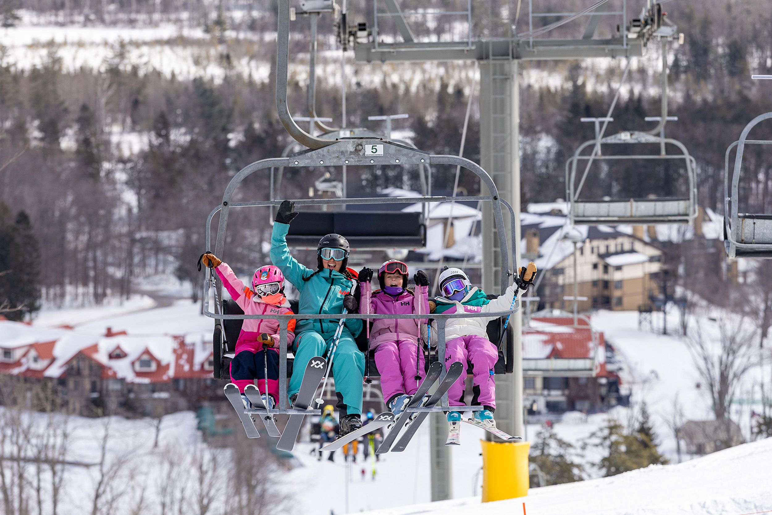 A family on the chairlift at The Highlands
