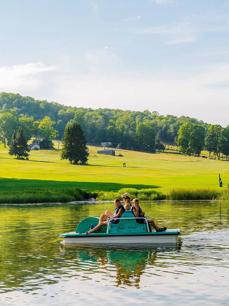 A family on a pedal boat
