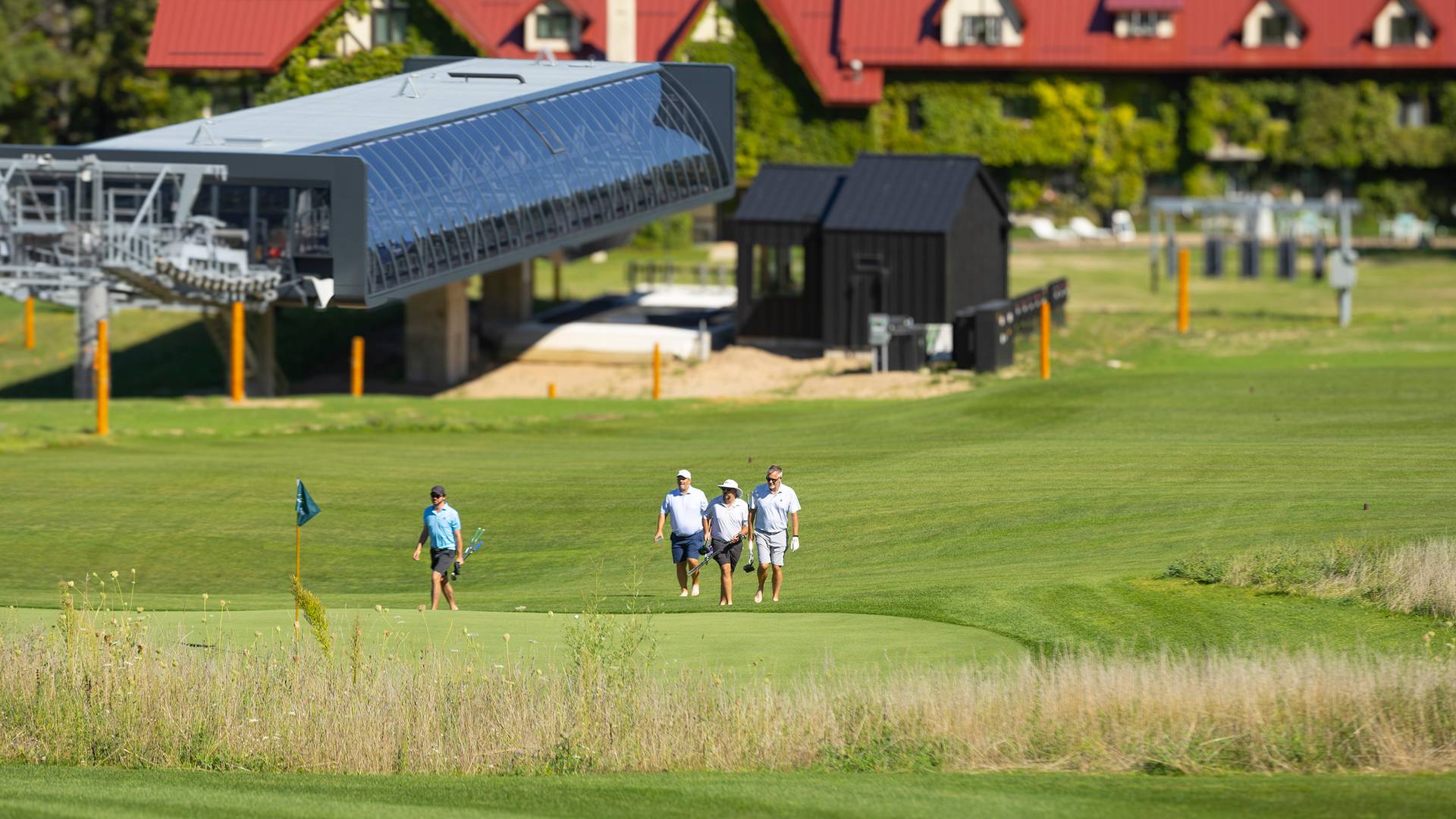 A group of golfers on Doon Brae near the Camelot 6 chairlift
