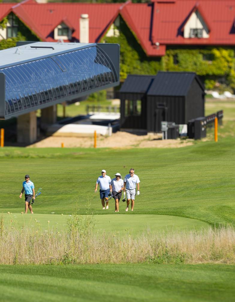 A group of golfers on Doon Brae near the Camelot 6 chairlift