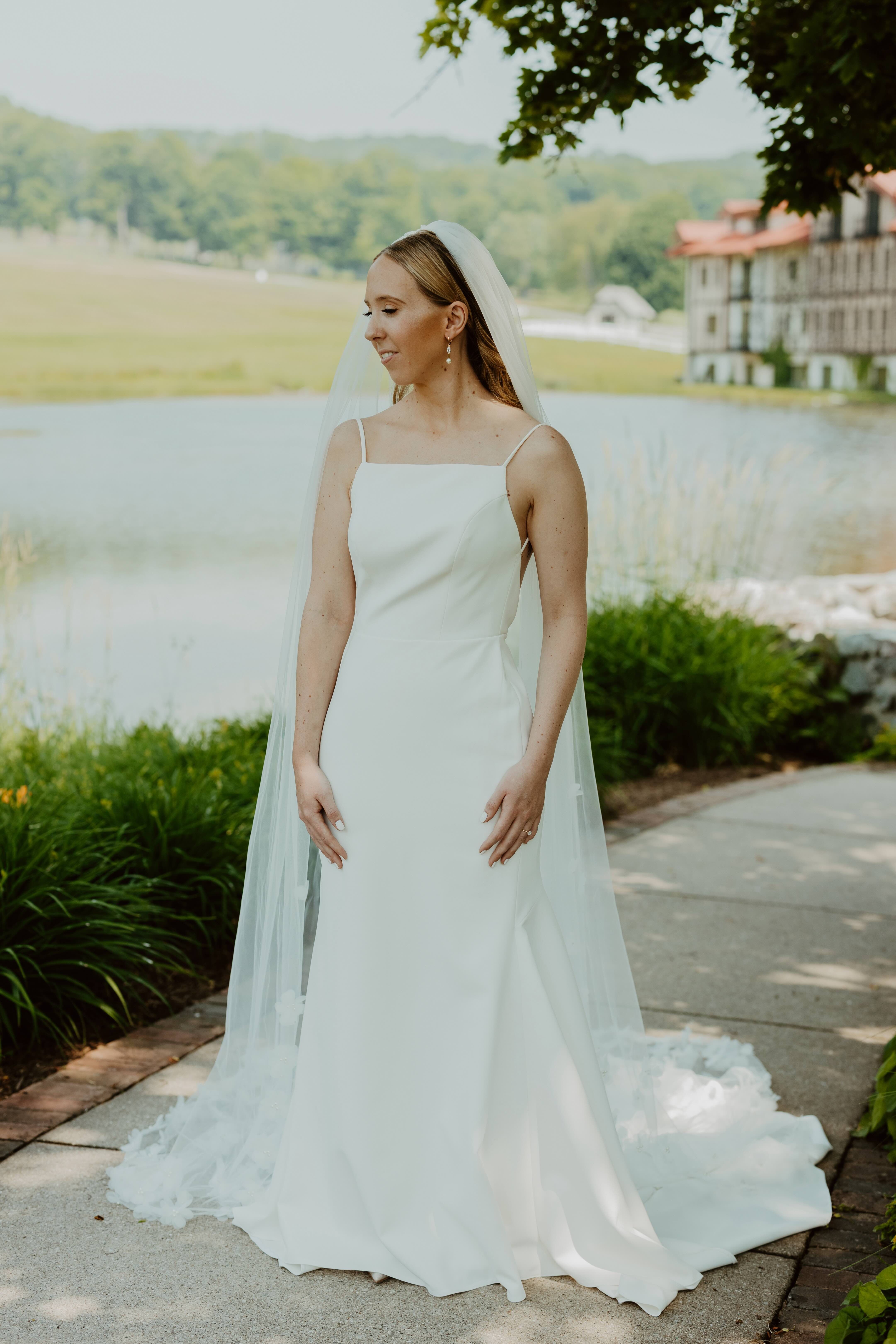 A bride posing near the Main Lodge pond