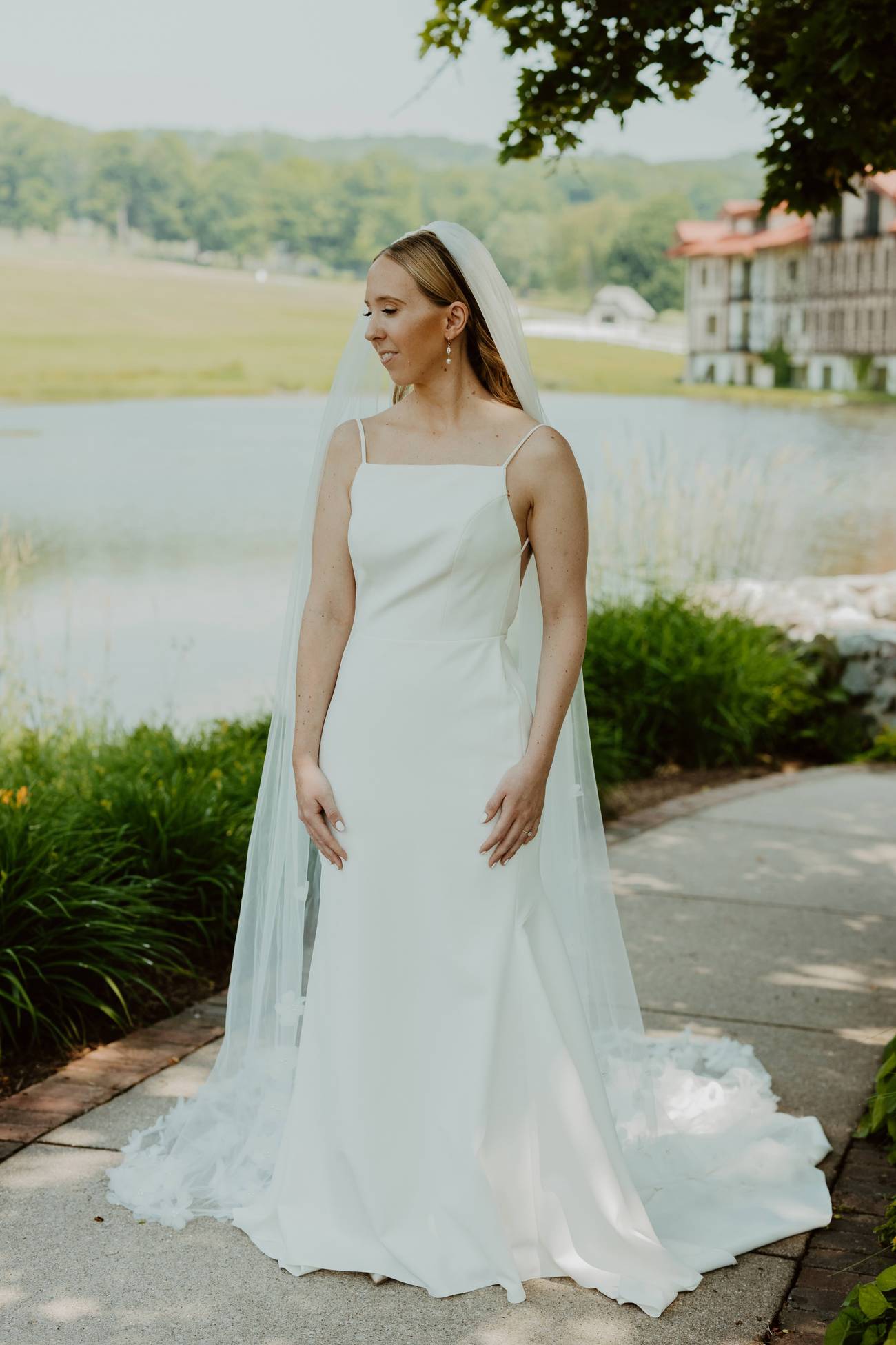 A bride posing near the Main Lodge pond