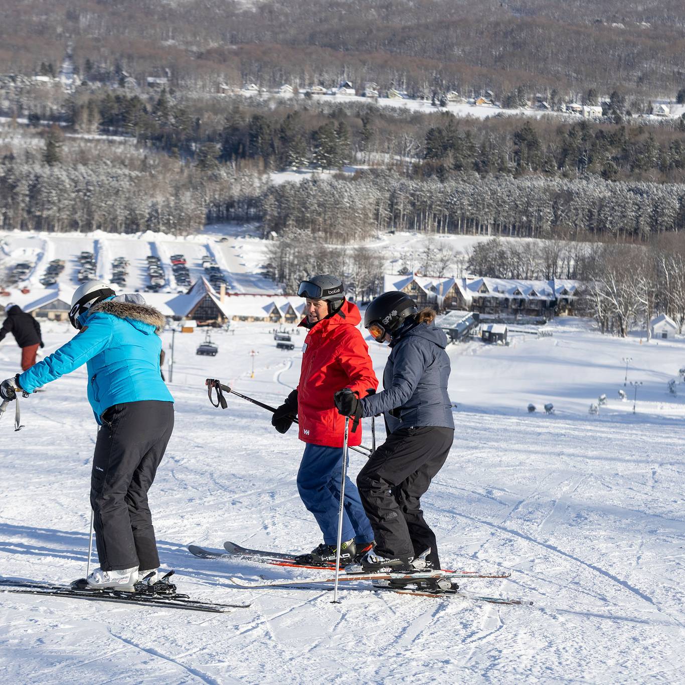 A group receiving a ski lesson at The Highlands
