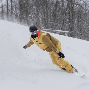 A snowboarder at The Highlands