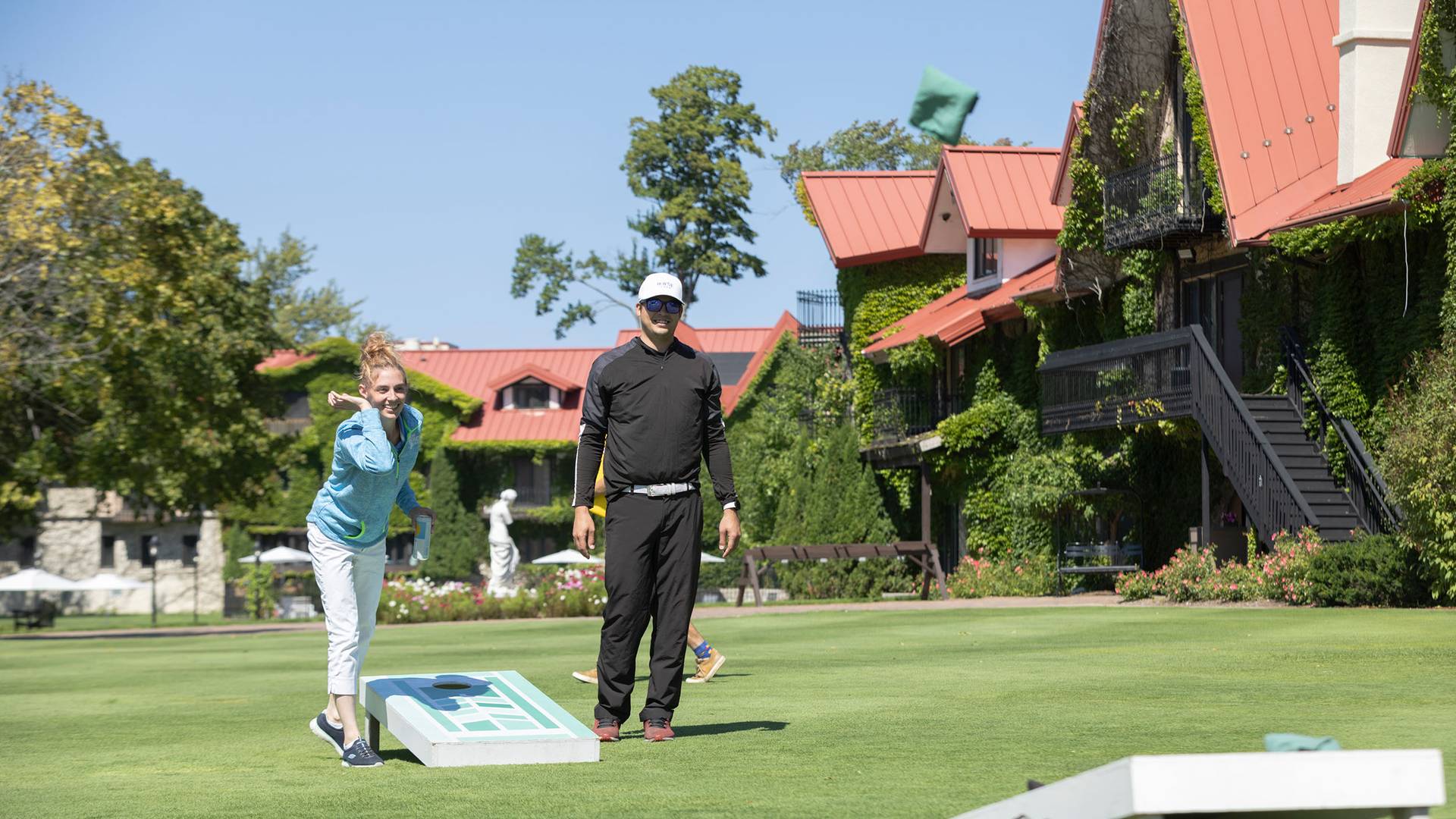A couple playing lawn games