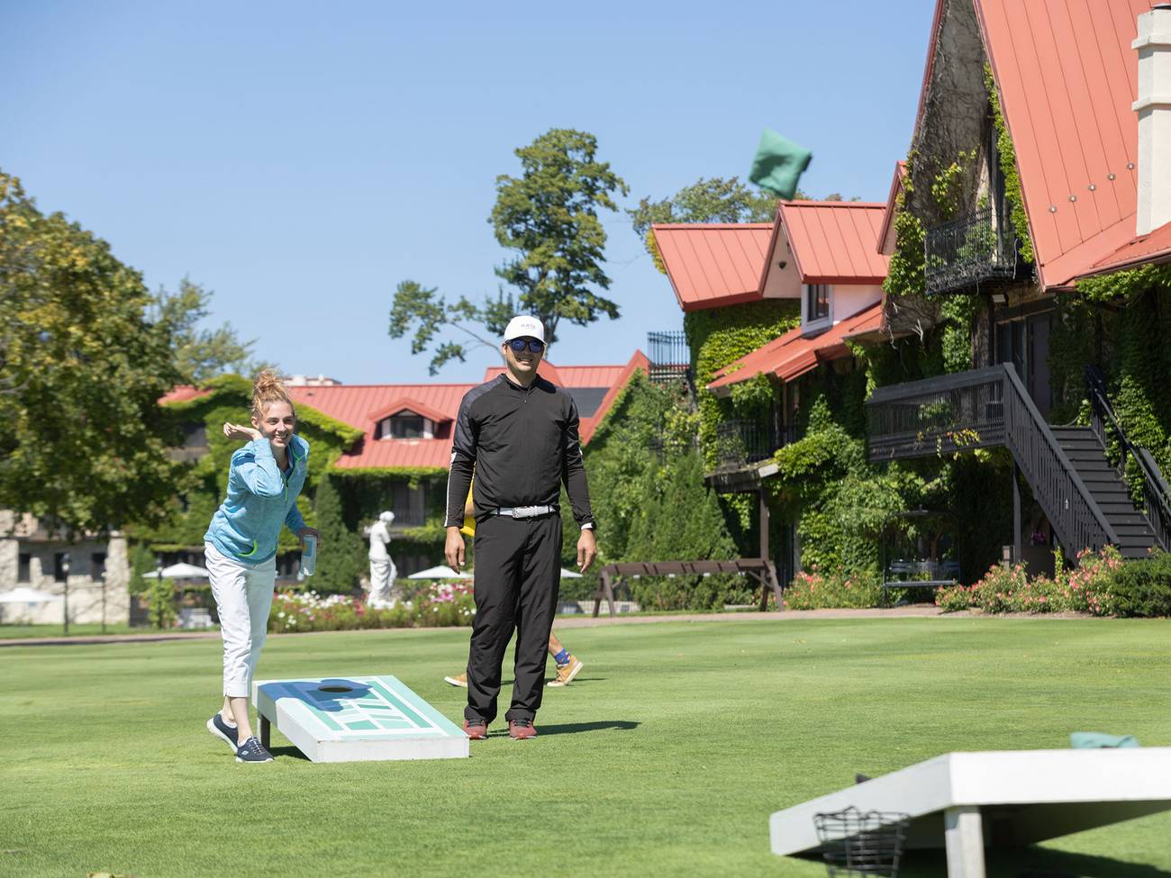 A couple playing lawn games