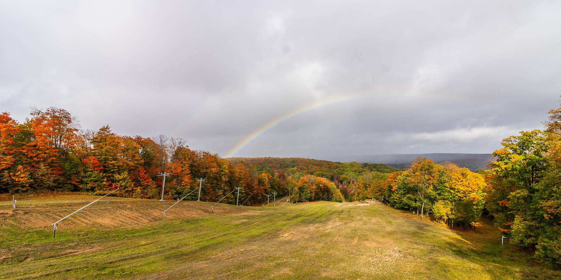 Fall foliage and a rainbow at The Highlands