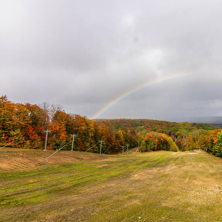 Fall foliage and a rainbow at The Highlands