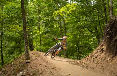 A mountain biker at The Highlands Bike Park