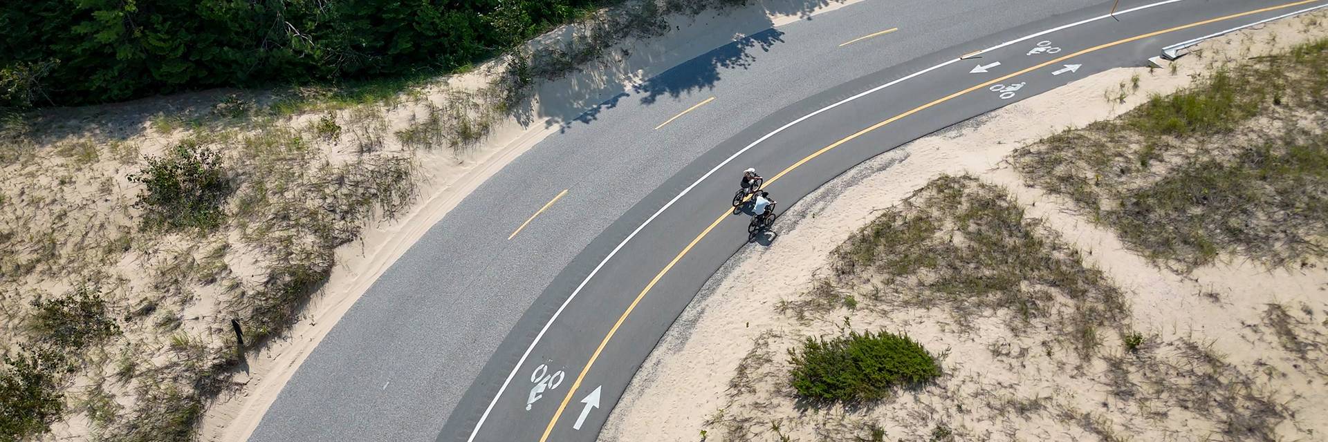 A drone shot of bikers on the Little Traverse Wheelway