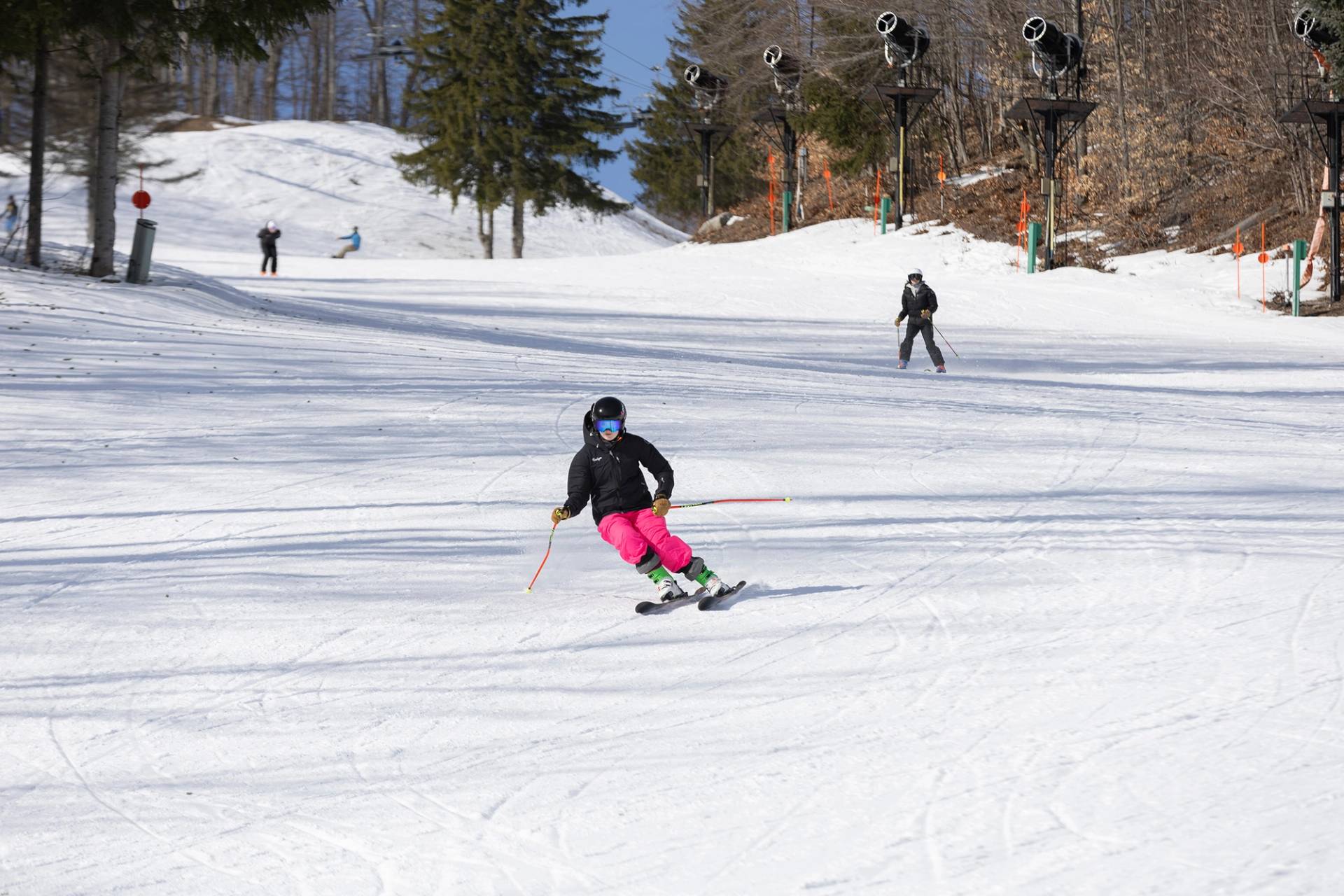 A woman skiing at The Highlands