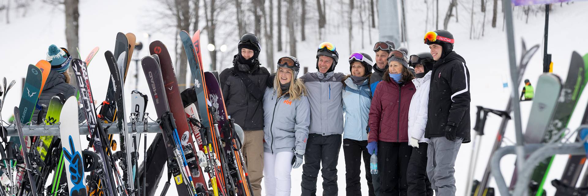 A group of people in snow gear posing
