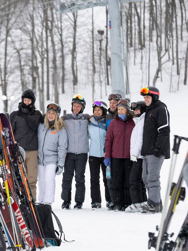 A group of people in snow gear posing