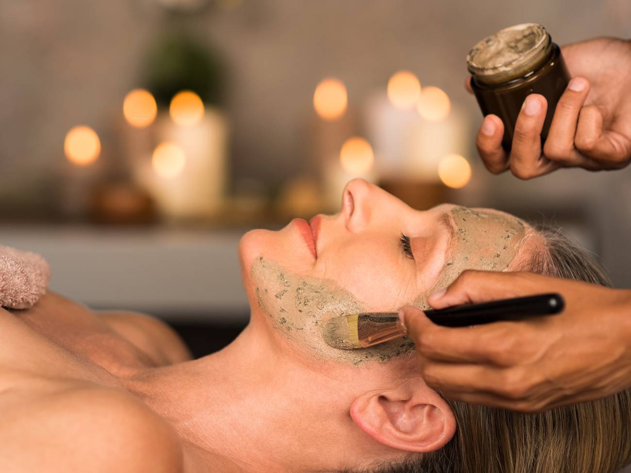 A woman receiving a spa treatment