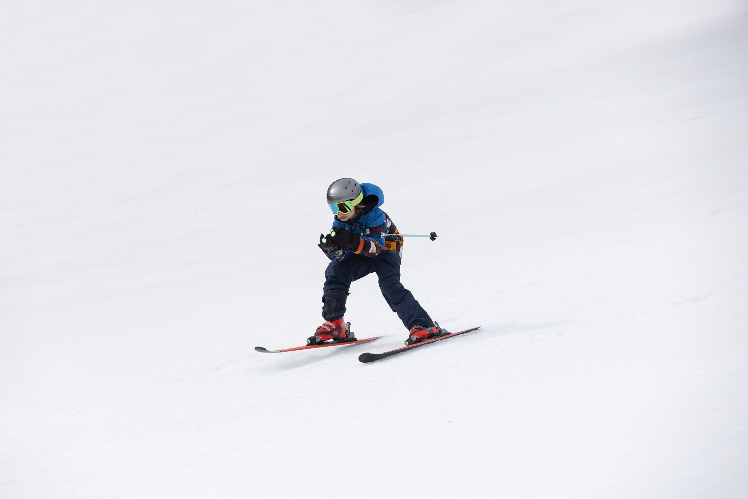 A boy ski racing at The Highlands