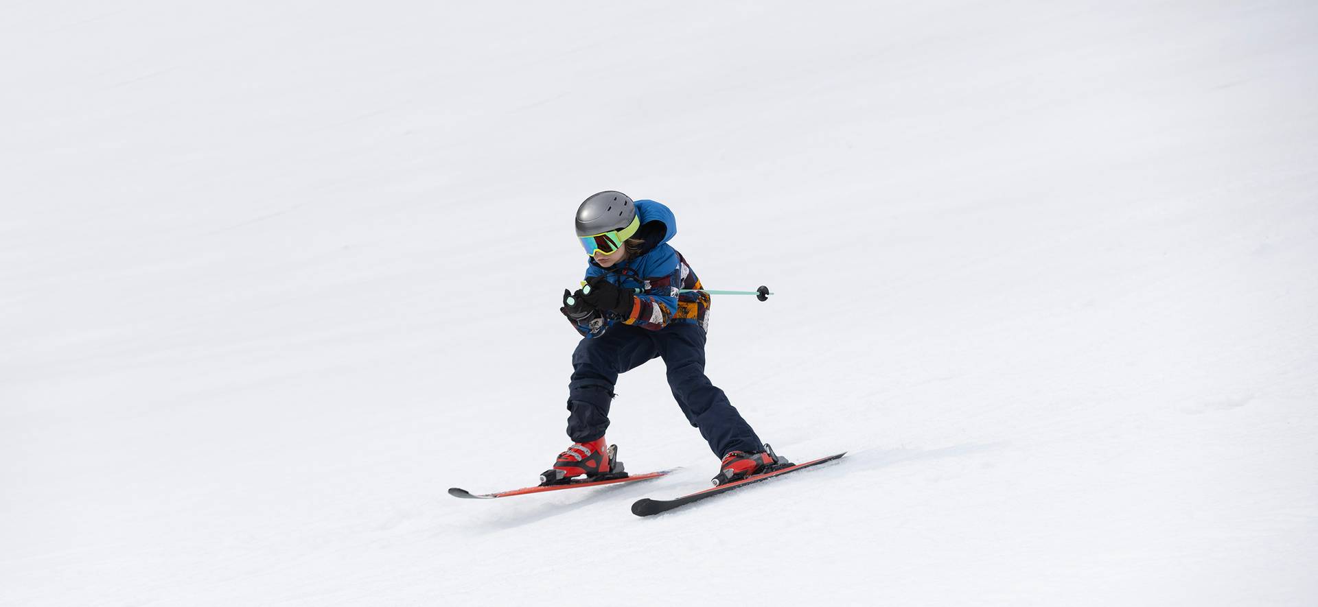 A boy ski racing at The Highlands