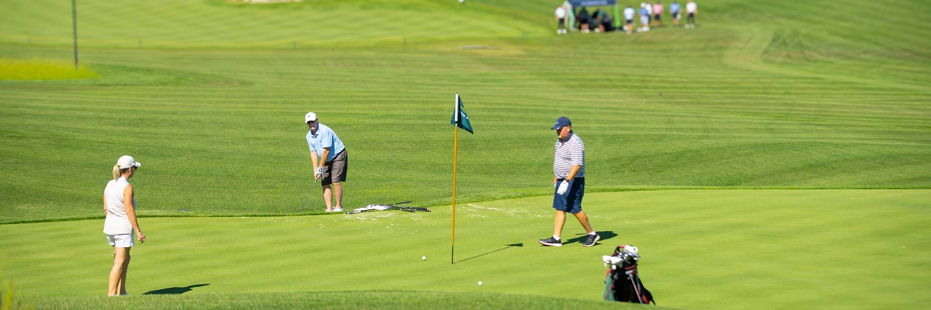 A group of golfers on Doon Brae
