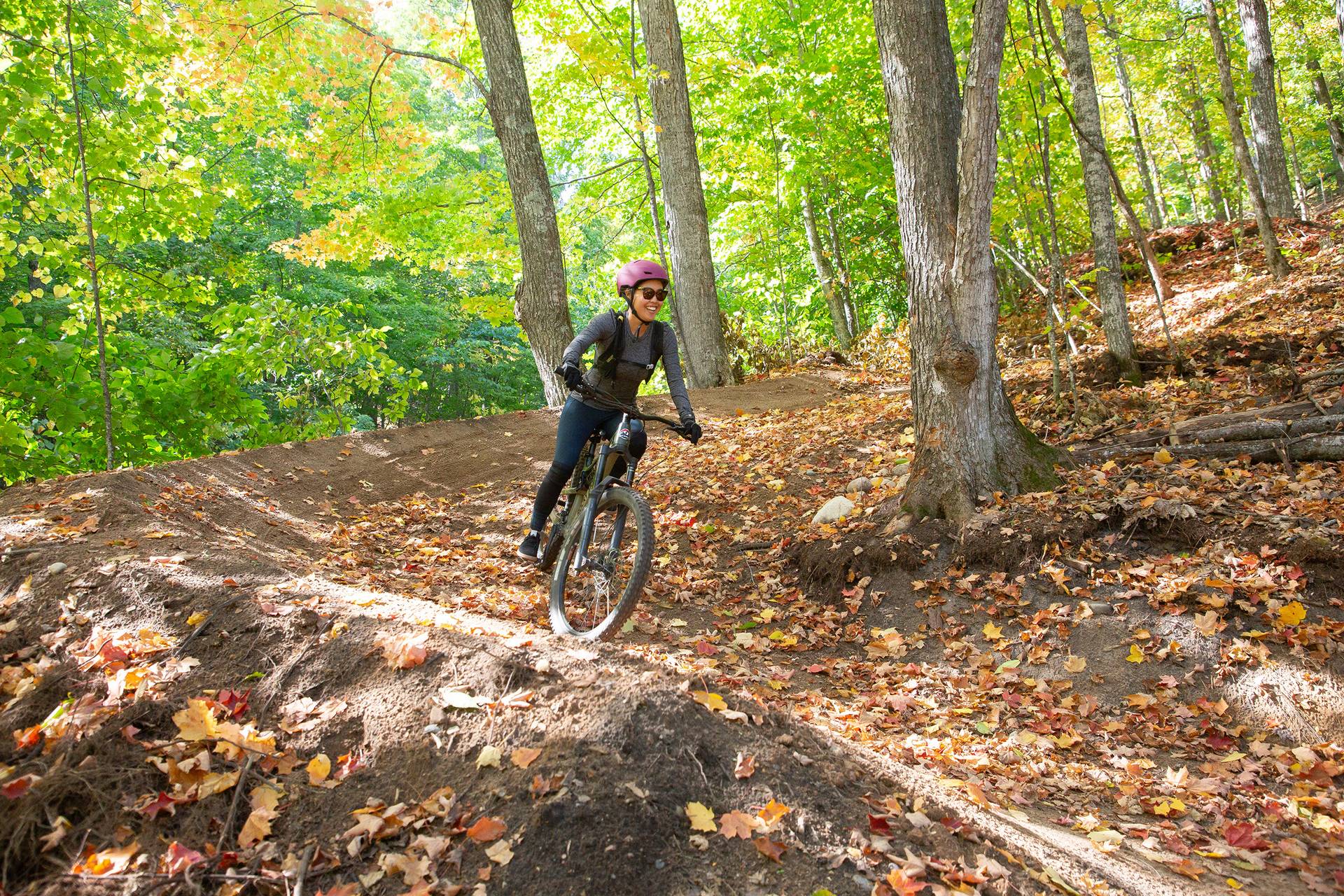 A woman on a mountain bike at The Highlands