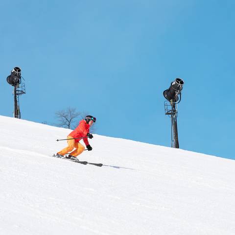 A woman skier at The Highlands