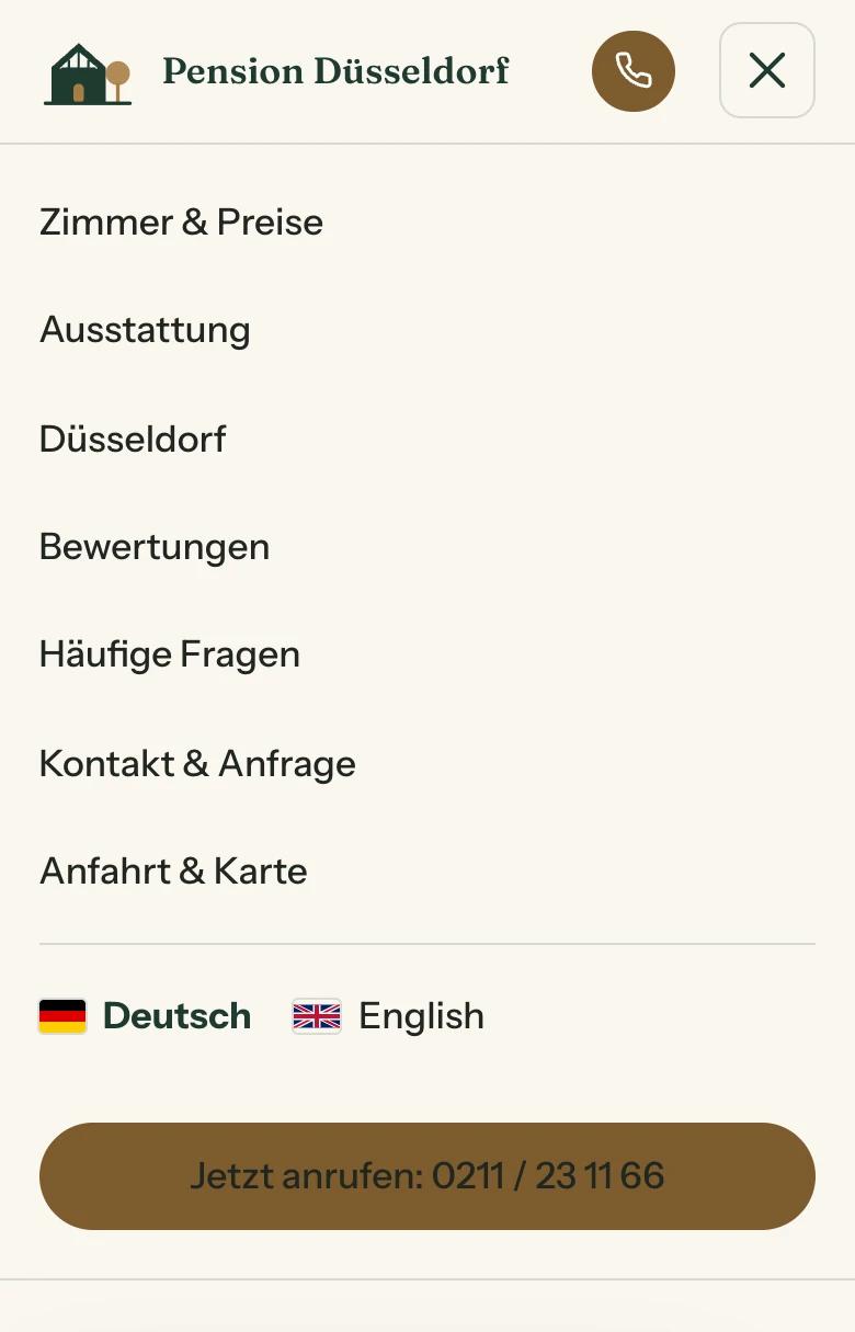 Ausgeklapptes Menü der mobilen Ansicht mit Sprachwahl Deutsch und Englisch